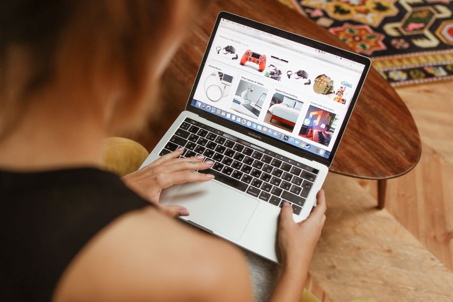 A customer browsing an online shop on her laptop